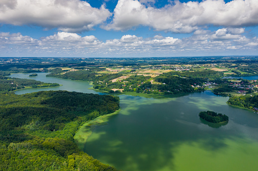 Aerial view of Kashubian Landscape Park. Kaszuby. Poland. Photo made by drone from above. Bird eye view.