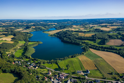 Aerial view of Kashubian Landscape Park. Kaszuby. Poland. Photo made by drone from above. Bird eye view.