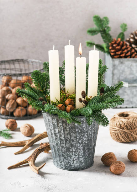 1. Advent. Christmas decorations with white advent candles.