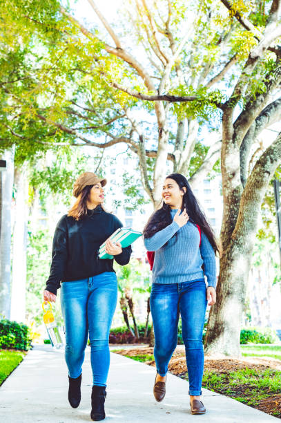istock Female college students on university campus 1191268355