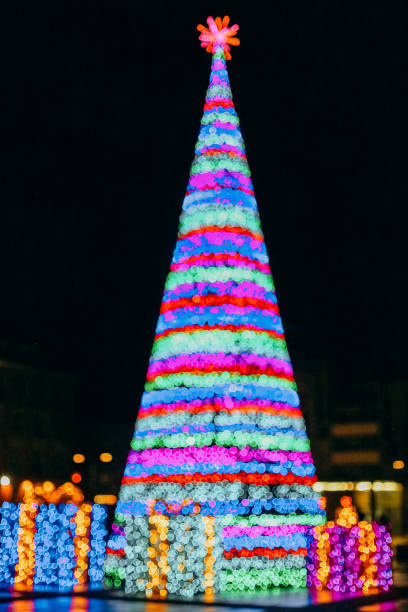 istock background christmas tree blur square brightly garlanded 1191269191