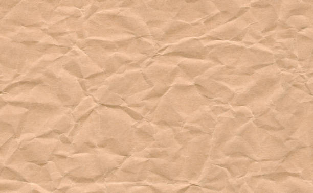 крупным планом мятый гранж коричневый фон текстуры бумаги. коричневый бумажный лист с пространством для текста, шаблона или абстрактного ф - brown paper paper crumpled brown стоковые фото и изображения