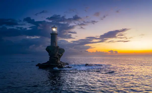 The beautiful Lighthouse Tourlitis of Chora in Andros island and a seagull