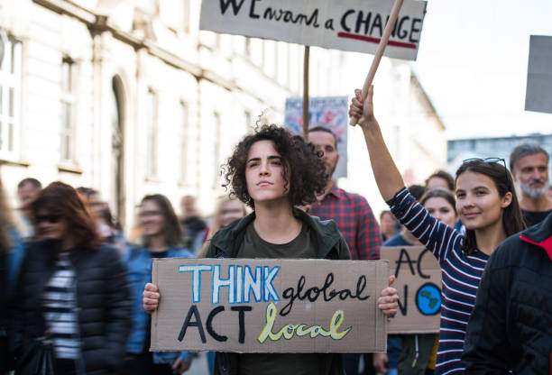istock People with placards and posters on global strike for climate change. 1191271830