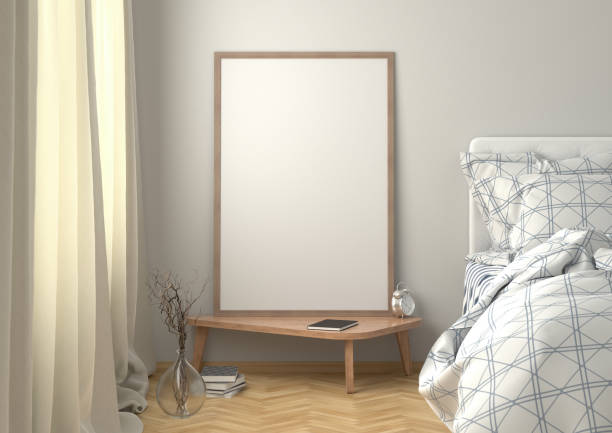 istock Vertical poster mock up on the night table in bedroom 1191275404