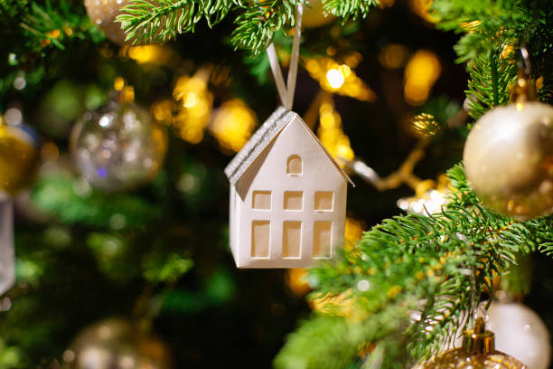 istock Decorated Christmas tree on blurred, sparkling background 1191281492