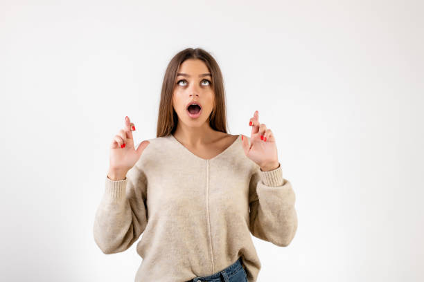 istock woman showing emotion isolated in studio 1191285975
