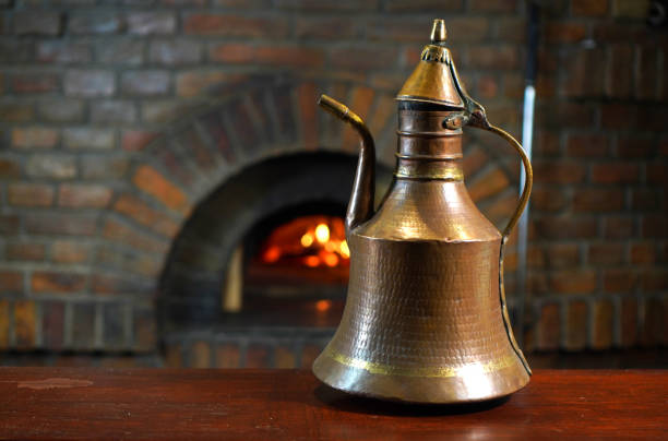An old copper jug in ancient restaurant