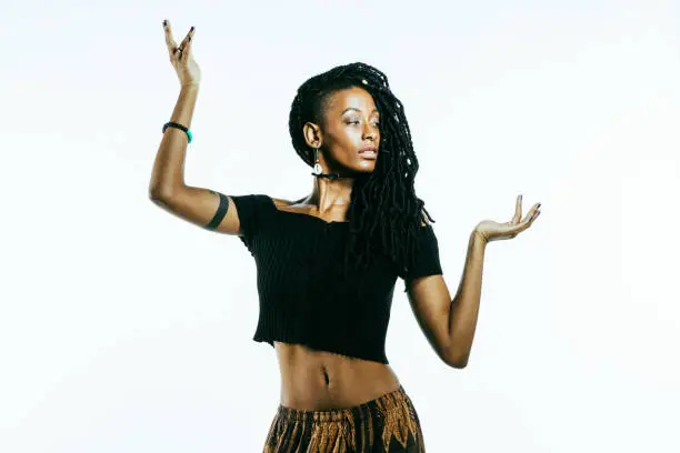 African American woman with dreadlocks looking at the camera