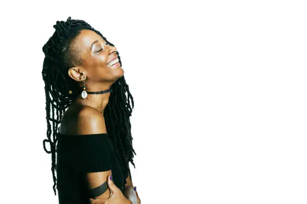 African American woman with dreadlocks looking at the camera