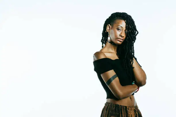 African American woman with dreadlocks looking at the camera