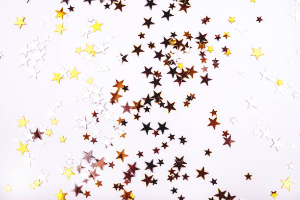 istock Golden and silver stars on white background. 1191291232