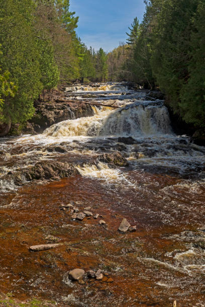 istock Rushing Stream Cutting Thought the Forest in the Spring 1191292151