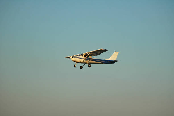 istock white single engine plane landing in small town airport 1191292332