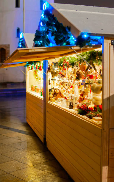 istock Market Square at night with the Christmas tree reflex 1191292479