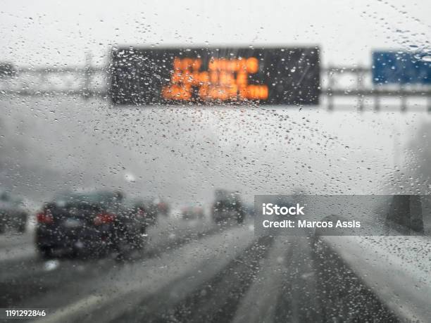 Hazardous Weather Condition On The Road Seen Through Windshield Stock Photo - Download Image Now