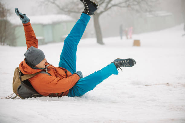 istock Childish man having fun on snow 1191313934
