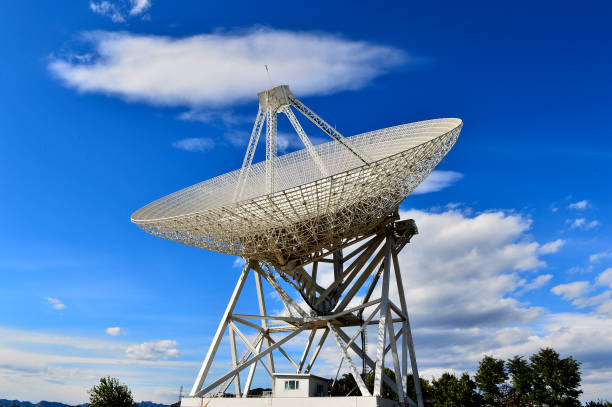 istock Array of satellite dishes or radio antennas against sky. Space o 1191317829