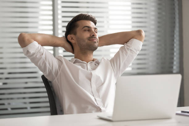 istock Satisfied businessman in comfortable office chair during break 1191319831