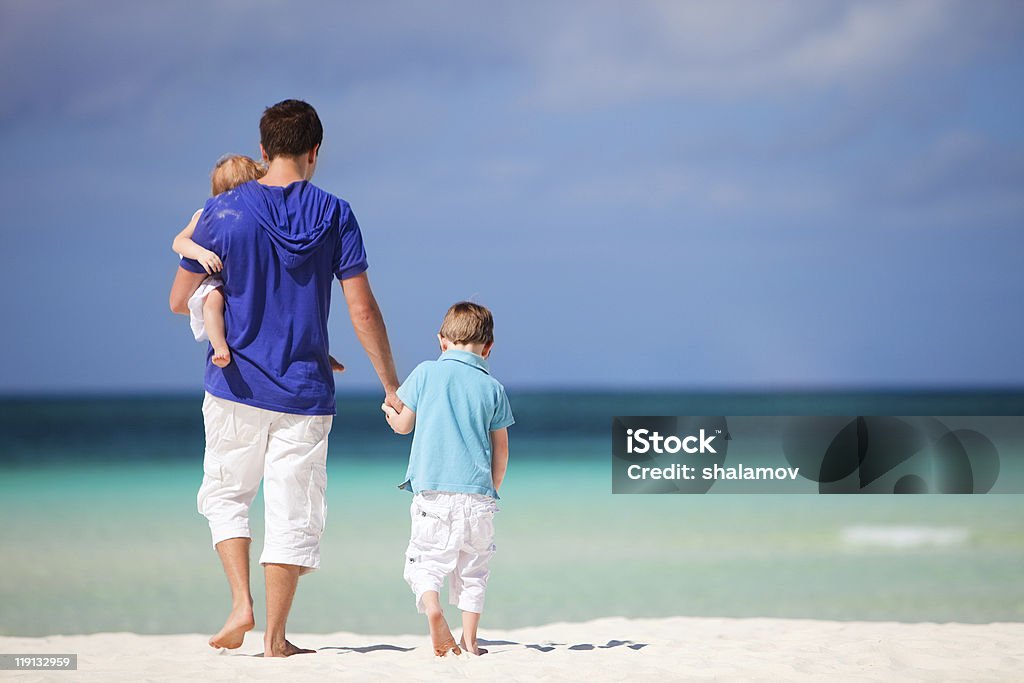 Famiglia in vacanza - Foto stock royalty-free di Acqua