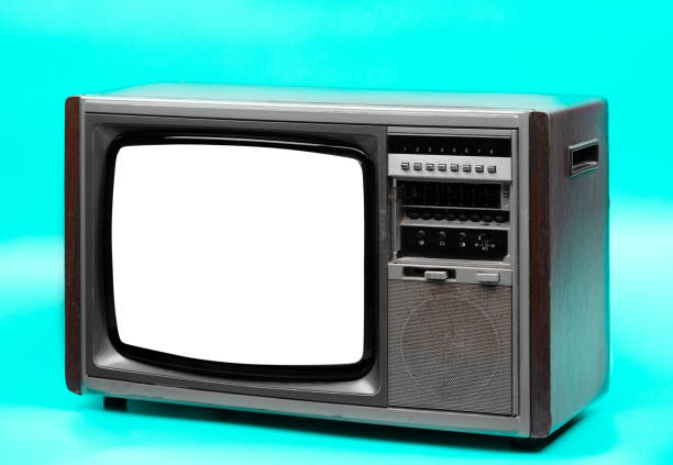 istock Vintage television with cut out screen on green background. 1191334864