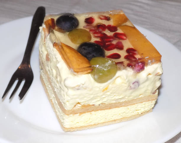 istock Slice of fruit cake on a plate 1191340067