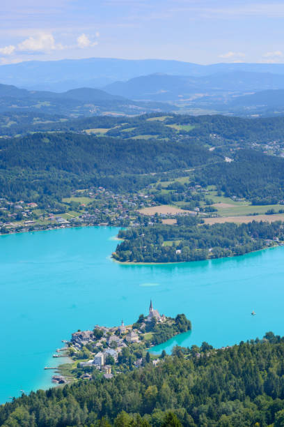View of a part of Woerthersee View of a part of Woerthersee in vertically format maria woerth stock pictures, royalty-free photos & images