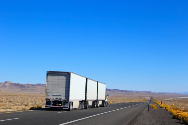 istock Triple Big Rig On The Open Highway 1191345618