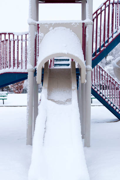 istock Playground After a Snowstorm - Slide and Stairs 1191346021