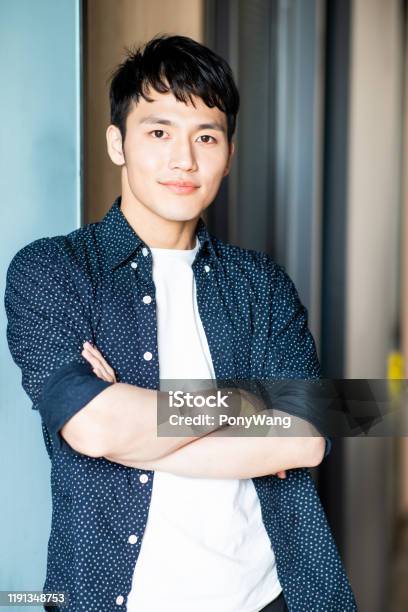 Young Man Look To You Stock Photo - Download Image Now - Korean Ethnicity, Japanese Ethnicity, Young Men