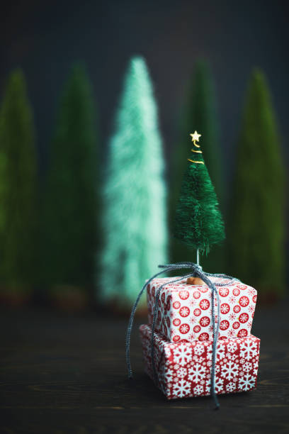 istock Christmas background with trees and gifts 1191348993