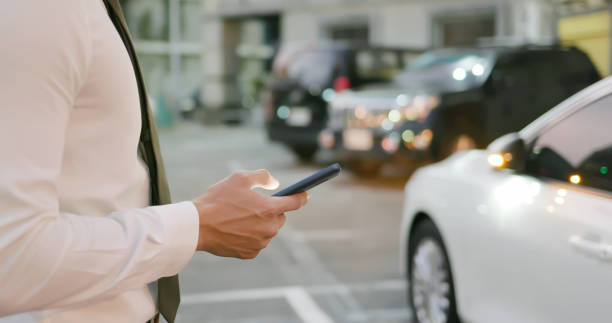 istock man unlock door of car 1191350698
