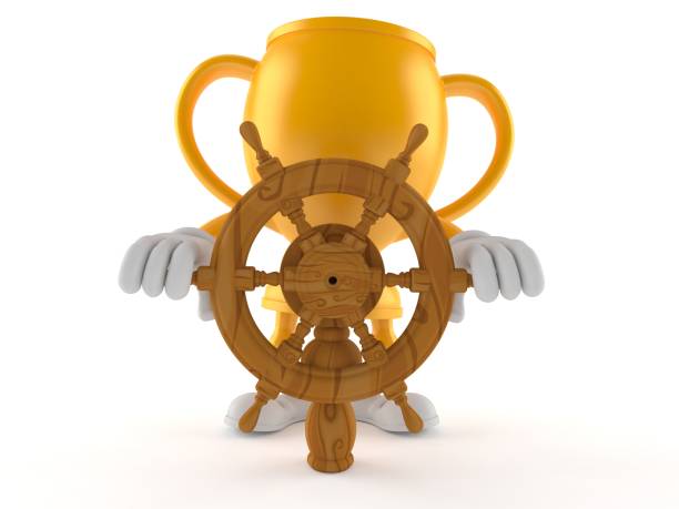 istock Golden trophy character holding ship wheel 1191361281
