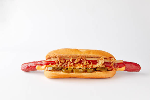 istock Appetizing hotdog lying on a white background 1191362093