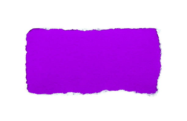istock A hole in white paper with torn edges isolated on a white background with a bright violet color paper background inside. Good sharp paper texture. 1191365646