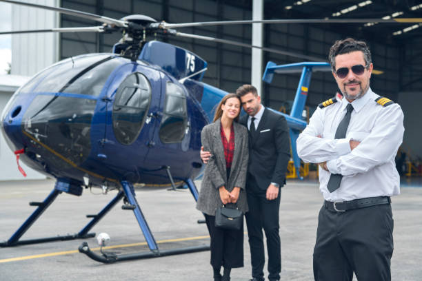 istock Enterprising women and men preparing their helicopter trip 1191365727