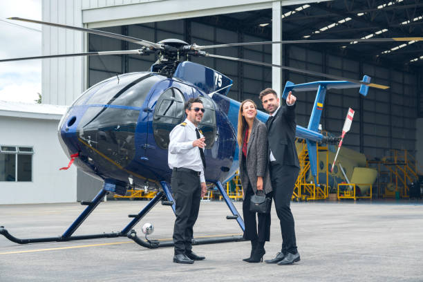 istock Enterprising women and men preparing their helicopter trip 1191365825