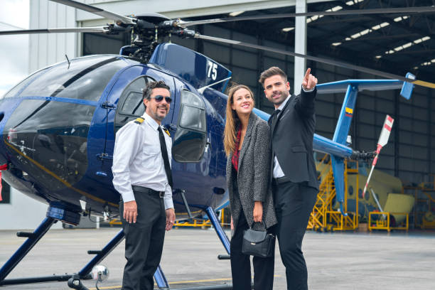 istock Enterprising women and men preparing their helicopter trip 1191365902