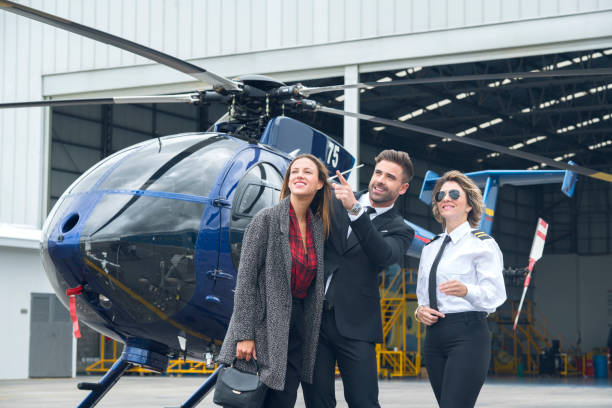 istock Enterprising women and men preparing their helicopter trip 1191366774
