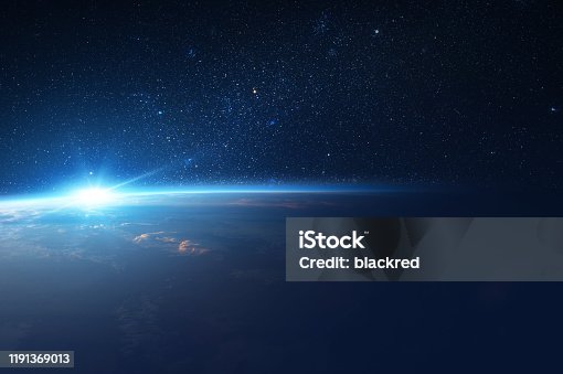 istock Sun Comes Up from Behind Earth in Space 1191369013