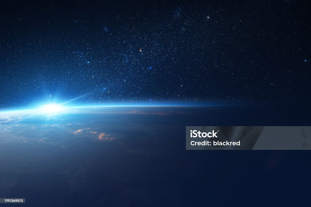 Sun Comes Up from Behind Earth in Space Sun Comes Up from Behind Earth in Space. Globe - Navigational Equipment Stock Photo