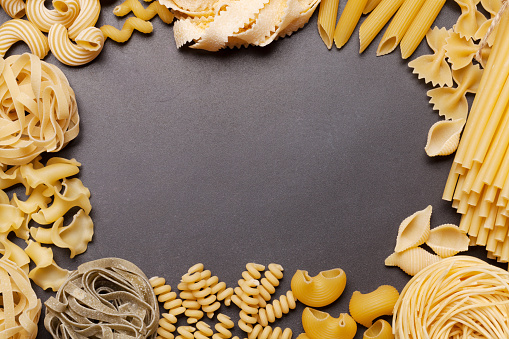 Various pasta. Top view flat lay with copy space