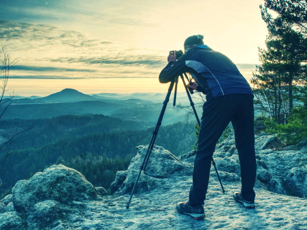 istock Nature photographer works.  Photographer working 1191377363