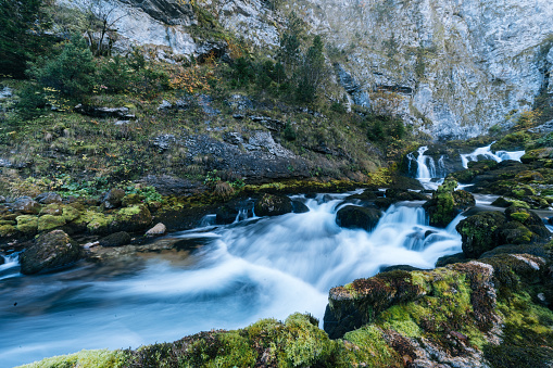 Blurred motion of rapids as they flow forward