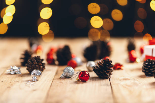 istock Christmas gift- Pine cones and branches  On the wood- 1191379296