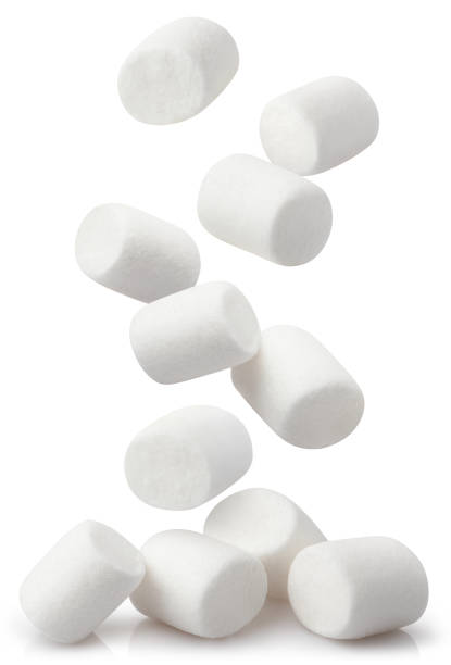 Falling marshmallows on white Falling white marshmallows, isolated on white chewy photos stock pictures, royalty-free photos & images