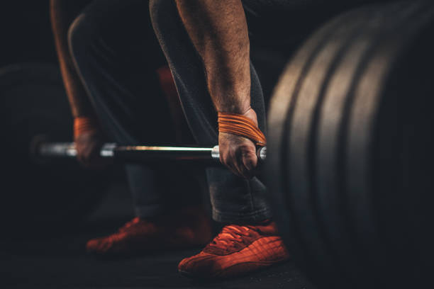 istock Body builder weightlifting in gym 1191380896