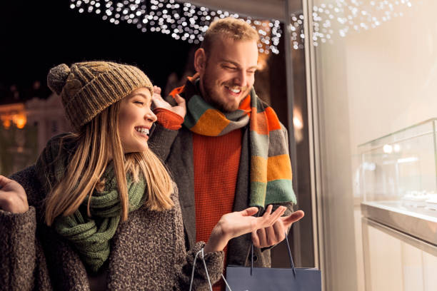 istock Christmas gift shopping in city 1191381410