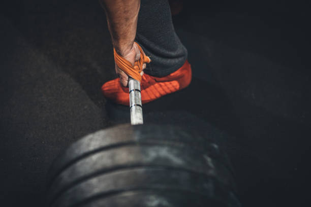 istock Man weightlifting in gym 1191381485