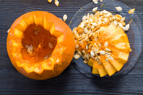 istock sliced and gutted orange pumpkin 1191384241